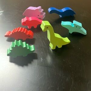 Bag of mini colored wooden Dinosaurs